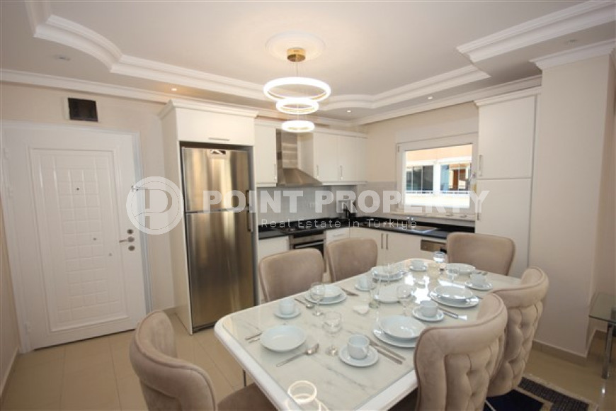 Трехкомнатная видовая квартира, 115м², с новой мебелью, в 50м от моря в районе Алании Демирташ-id-1732-фото-14