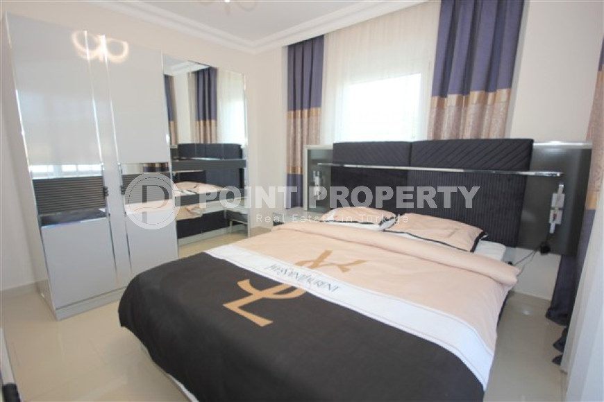 Трехкомнатная видовая квартира, 115м², с новой мебелью, в 50м от моря в районе Алании Демирташ-id-1732-фото-18