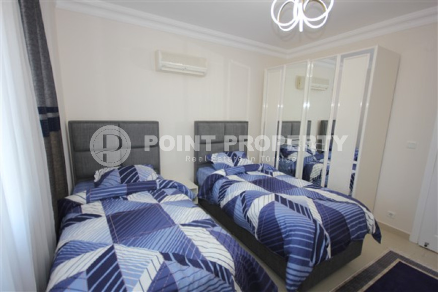 Трехкомнатная видовая квартира, 115м², с новой мебелью, в 50м от моря в районе Алании Демирташ-id-1732-фото-23