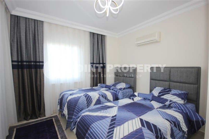 Трехкомнатная видовая квартира, 115м², с новой мебелью, в 50м от моря в районе Алании Демирташ-id-1732-фото-24