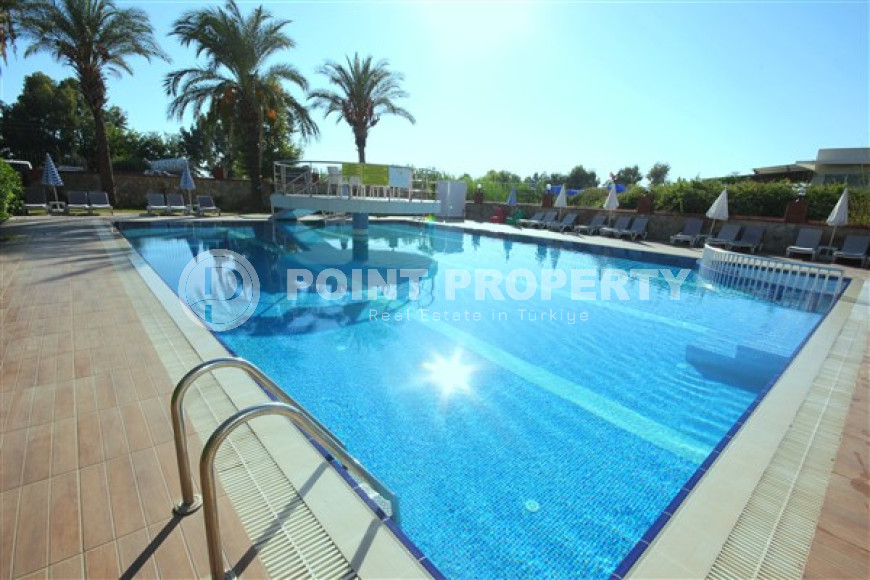 Трехкомнатная видовая квартира, 115м², с новой мебелью, в 50м от моря в районе Алании Демирташ-id-1732-фото-34