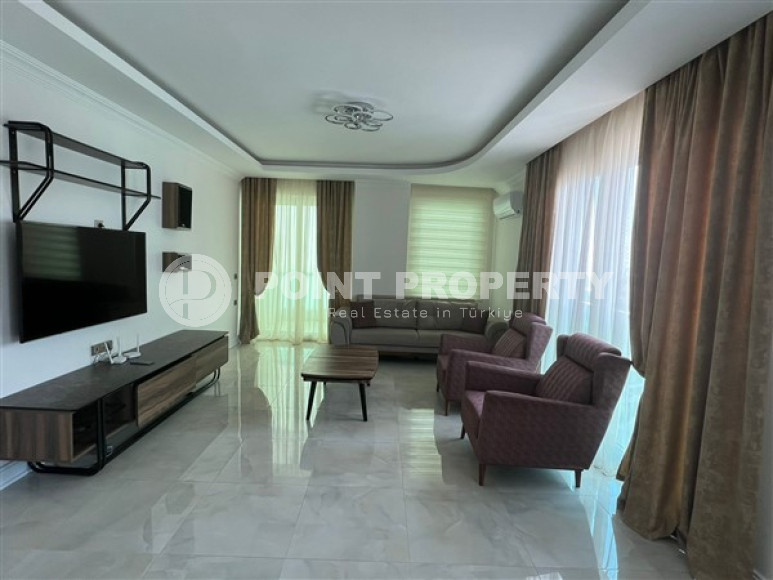 Новая квартира с двумя спальнями, 110м², на высоком этаже с видом на море в Махмутларе, Алания-id-1737-фото-2