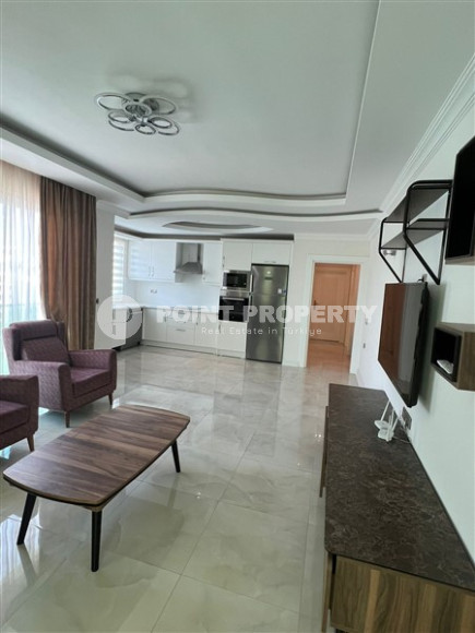 Новая квартира с двумя спальнями, 110м², на высоком этаже с видом на море в Махмутларе, Алания-id-1737-фото-3