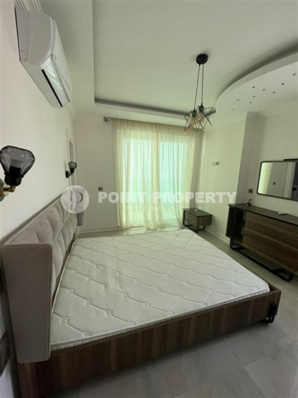 Новая квартира с двумя спальнями, 110м², на высоком этаже с видом на море в Махмутларе, Алания-id-1737-фото-6