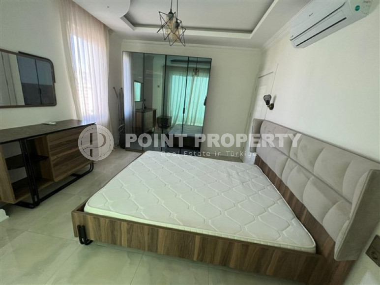 Новая квартира с двумя спальнями, 110м², на высоком этаже с видом на море в Махмутларе, Алания-id-1737-фото-7