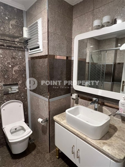 Новая квартира с двумя спальнями, 110м², на высоком этаже с видом на море в Махмутларе, Алания-id-1737-фото-9