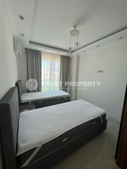 Новая квартира с двумя спальнями, 110м², на высоком этаже с видом на море в Махмутларе, Алания-id-1737-фото-10