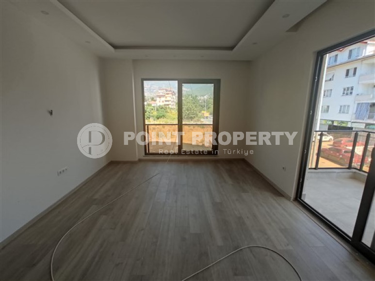 Two bedroom apartment, 75m² in a complex at the final stage of construction, in the area of Alanya - Oba-id-1745-photo-3