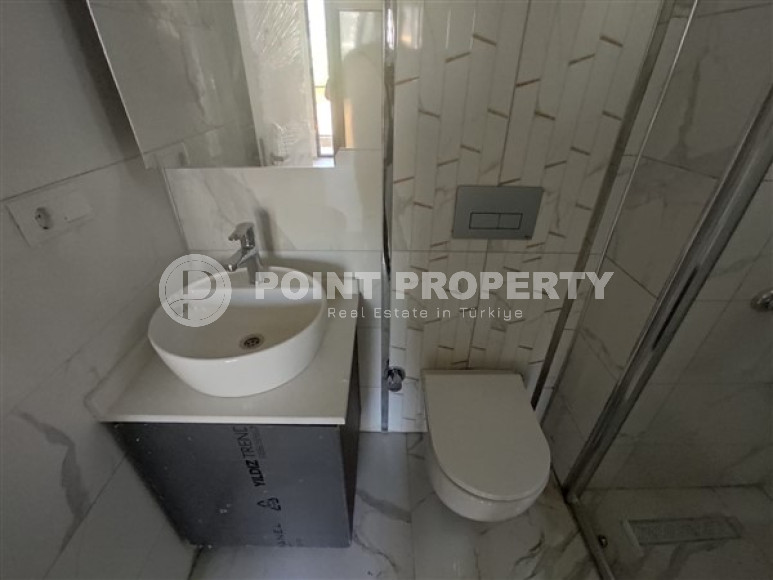 Two bedroom apartment, 75m² in a complex at the final stage of construction, in the area of Alanya - Oba-id-1745-photo-12