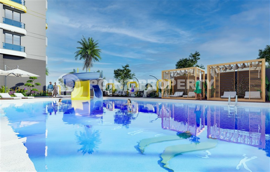 New apartment with two bedrooms, 85m². in a complex under construction in Mahmutlar area, Alanya-id-1747-photo-12