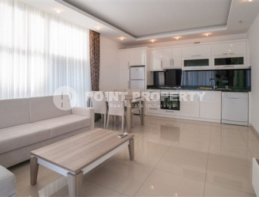 Меблированная квартира 1+1 в самом сердце Алании в современном доме с инфраструктурой-id-1751-фото-3