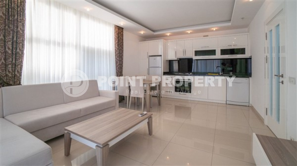 Меблированная квартира 1+1 в самом сердце Алании в современном доме с инфраструктурой-id-1751-фото-3