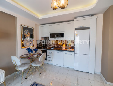 Меблированная квартира 1+1 в комплексе с отличной локацией в районе Махмутлар, 55 м2.-id-1109-фото-3