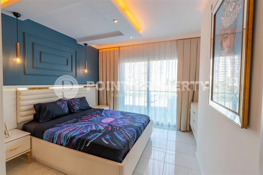 Furnished 1+1 apartment in a complex with an excellent location in the Mahmutlar area, 55 m2.-id-1109-photo-5