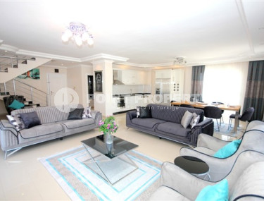 Трехкомнатная видовая двухуровневая квартира, 150м², в 50м от моря в районе Алании Демирташ-id-1757-фото-1