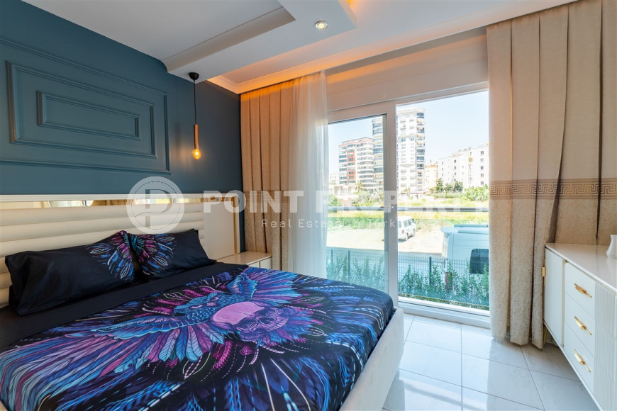Furnished 1+1 apartment in a complex with an excellent location in the Mahmutlar area, 55 m2.-id-1109-photo-7