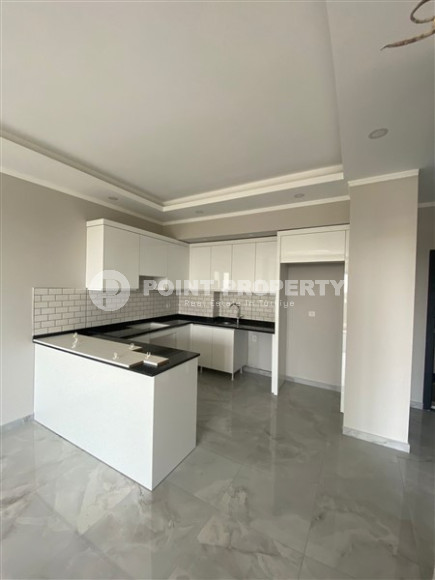 New one-bedroom apartment, 70m², in a complex with good infrastructure in Avsallar, Alanya-id-1758-photo-2