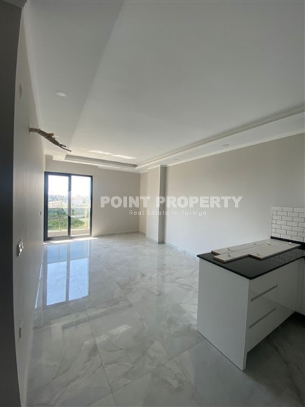 New one-bedroom apartment, 70m², in a complex with good infrastructure in Avsallar, Alanya-id-1758-photo-3
