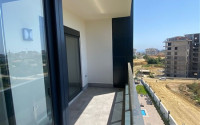 New one-bedroom apartment, 70m², in a complex with good infrastructure in Avsallar, Alanya-id-1758-photo-8