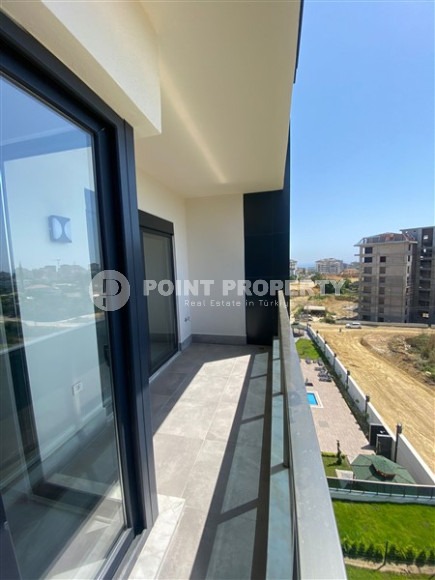 New one-bedroom apartment, 70m², in a complex with good infrastructure in Avsallar, Alanya-id-1758-photo-8