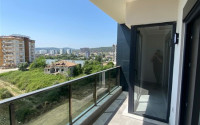 New one-bedroom apartment, 70m², in a complex with good infrastructure in Avsallar, Alanya-id-1758-photo-9