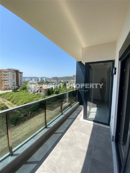 New one-bedroom apartment, 70m², in a complex with good infrastructure in Avsallar, Alanya-id-1758-photo-9