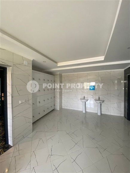 New one-bedroom apartment, 70m², in a complex with good infrastructure in Avsallar, Alanya-id-1758-photo-13