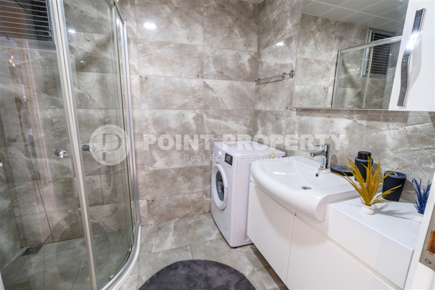 Furnished 1+1 apartment in a complex with an excellent location in the Mahmutlar area, 55 m2.-id-1109-photo-10