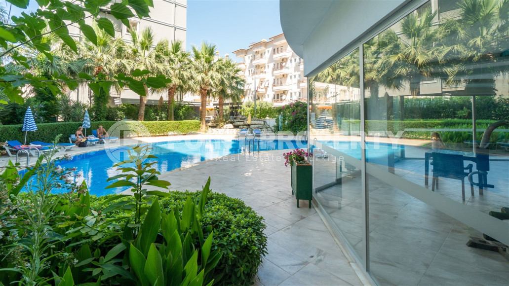 Furnished 1+1 apartment in a complex with an excellent location in the Mahmutlar area, 55 m2.-id-1109-photo-22