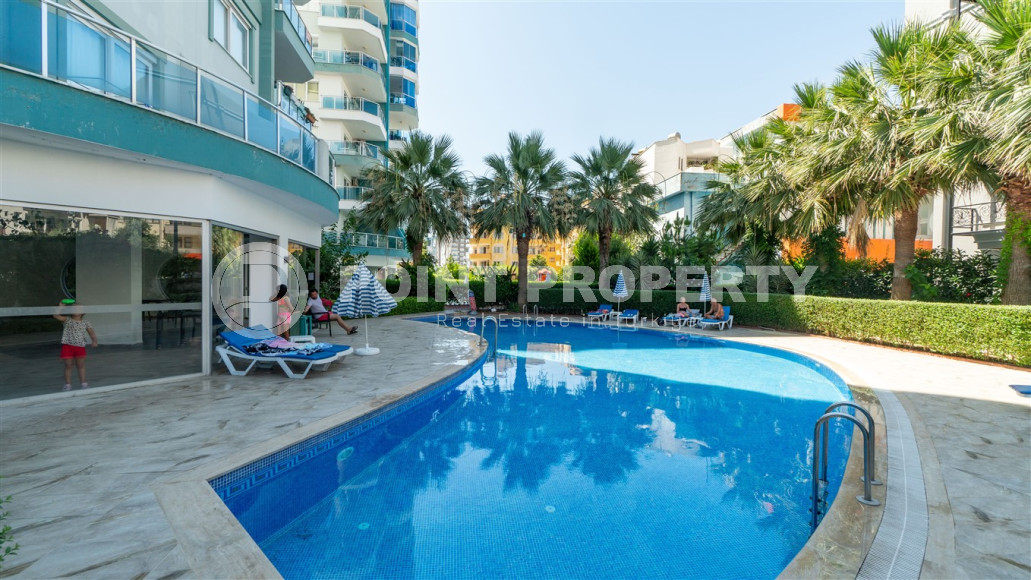 Furnished 1+1 apartment in a complex with an excellent location in the Mahmutlar area, 55 m2.-id-1109-photo-24