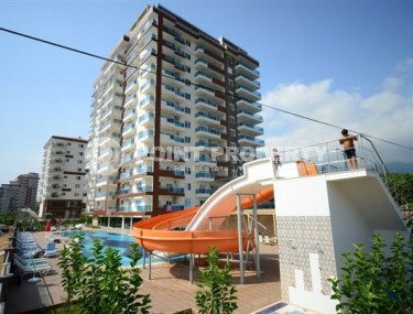 Меблированная трехкомнатная квартира, 120м², в резиденции премиум класса, у моря в Махмутларе-id-1768-фото-1