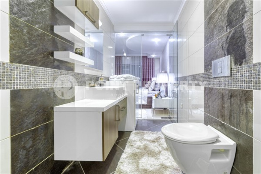 Элегантная трехкомнатная квартира, 120м² в комфортабельной резиденции в районе Алании Конаклы, в 300м от моря-id-1774-фото-26