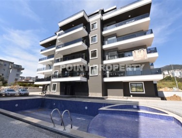 Three bedroom apartment, 165m², in a new urban building in Oba, Alanya-id-1799-photo-1