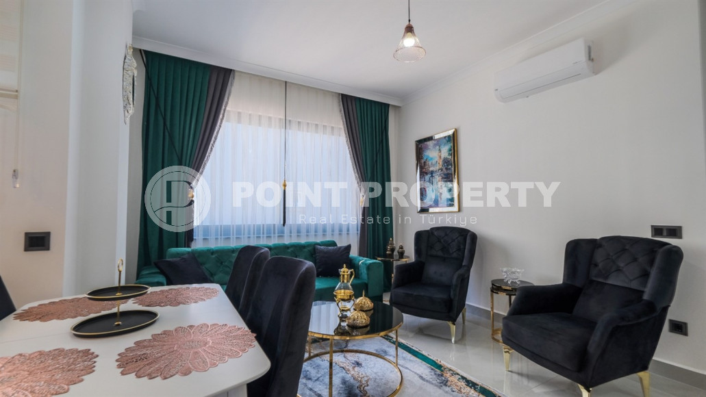 Двухкомнатная квартира в одном из развитых районов Алании в Махмутлар. Планировка 1+1, 350 метров до моря.-id-1112-фото-3