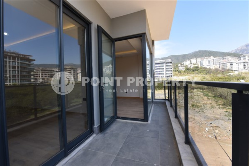 Three bedroom apartment, 165m², in a new urban building in Oba, Alanya-id-1799-photo-7
