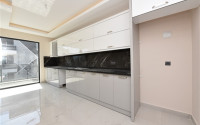 Three bedroom apartment, 165m², in a new urban building in Oba, Alanya-id-1799-photo-11
