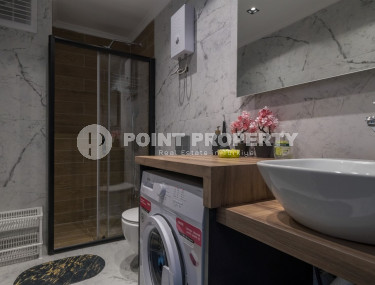 Двухкомнатная квартира в одном из развитых районов Алании в Махмутлар. Планировка 1+1, 350 метров до моря.-id-1112-фото-4