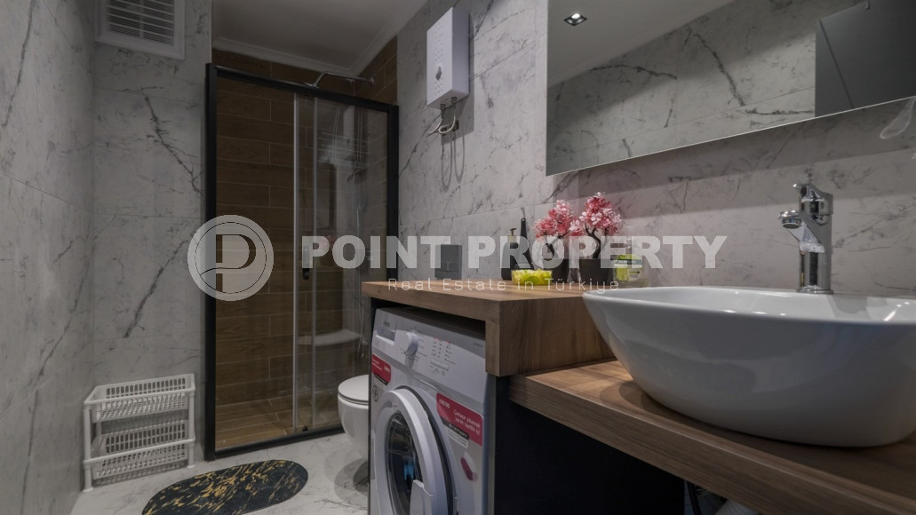 Двухкомнатная квартира в одном из развитых районов Алании в Махмутлар. Планировка 1+1, 350 метров до моря.-id-1112-фото-4