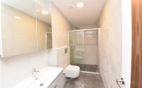Three bedroom apartment, 165m², in a new urban building in Oba, Alanya-id-1799-photo-16