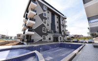 Three bedroom apartment, 165m², in a new urban building in Oba, Alanya-id-1799-photo-29