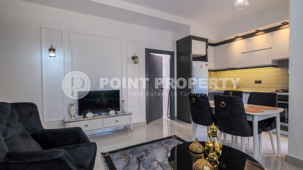 Двухкомнатная квартира в одном из развитых районов Алании в Махмутлар. Планировка 1+1, 350 метров до моря.-id-1112-фото-6