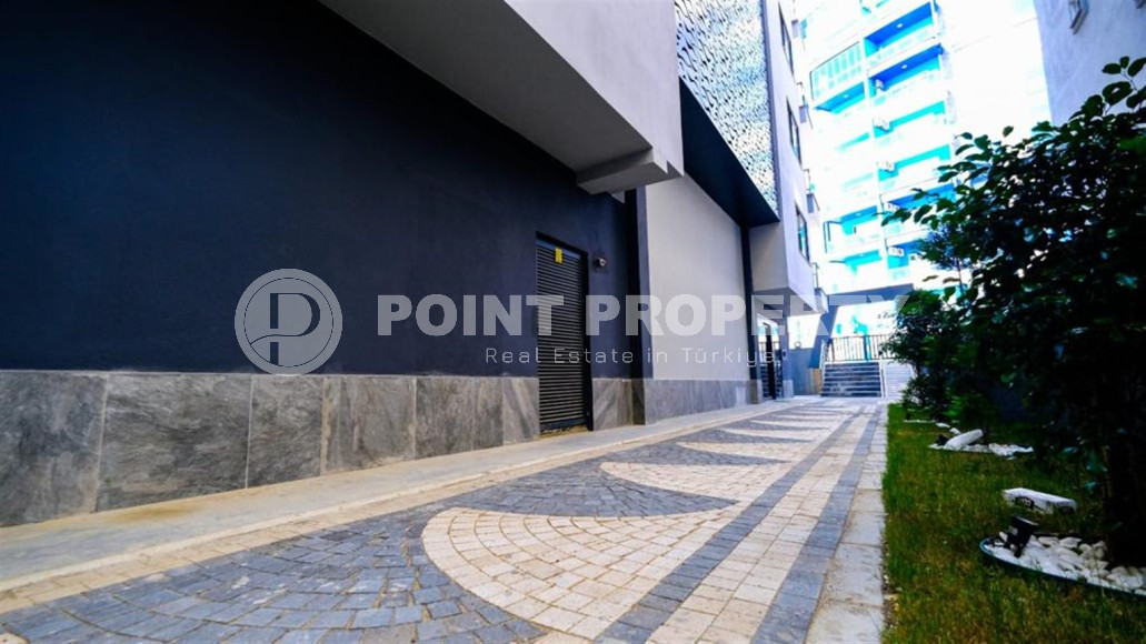 Двухкомнатная квартира в одном из развитых районов Алании в Махмутлар. Планировка 1+1, 350 метров до моря.-id-1112-фото-12