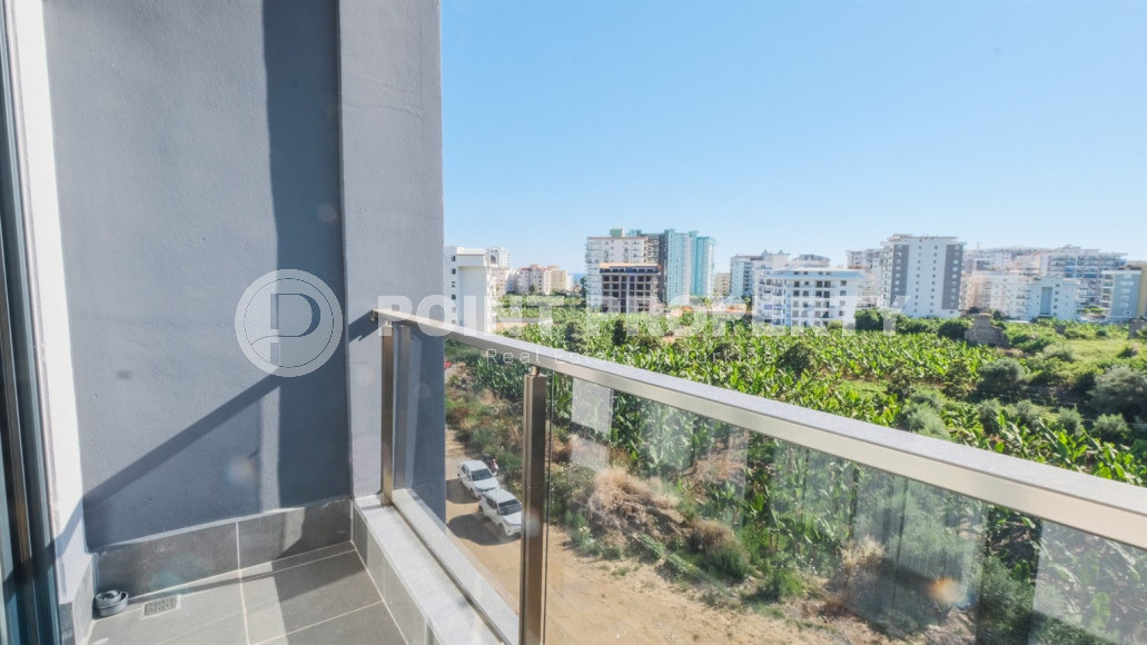 Двухкомнатная квартира в одном из развитых районов Алании в Махмутлар. Планировка 1+1, 350 метров до моря.-id-1112-фото-21