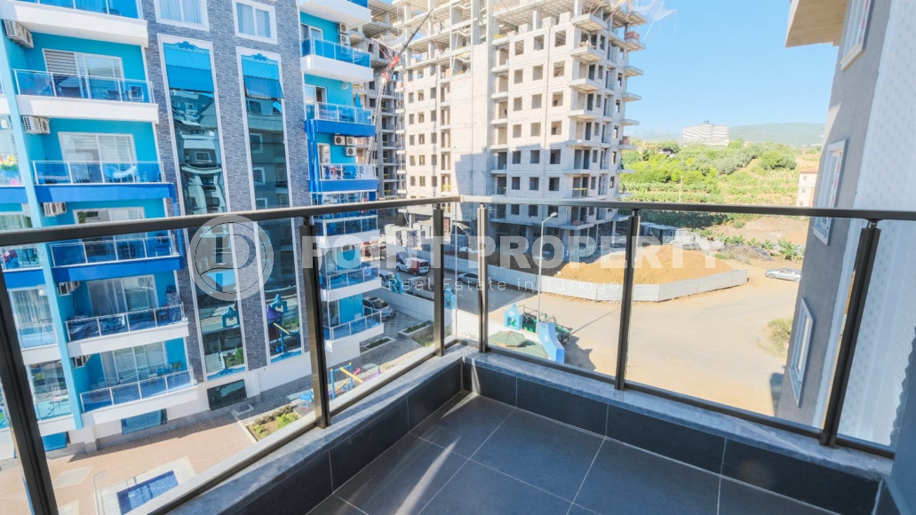 Двухкомнатная квартира в одном из развитых районов Алании в Махмутлар. Планировка 1+1, 350 метров до моря.-id-1112-фото-22