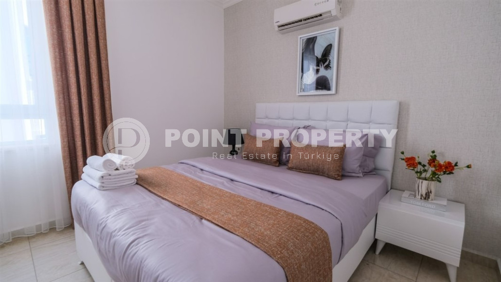 Уютные меблированные апартаменты планировкой 1+1, 55 м2, в самом центре Аланьи в районе самого известного пляжа Клеопатры.-id-1113-фото-3