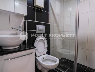 Уютные меблированные апартаменты планировкой 1+1, 55 м2, в самом центре Аланьи в районе самого известного пляжа Клеопатры.-id-1113-фото-4