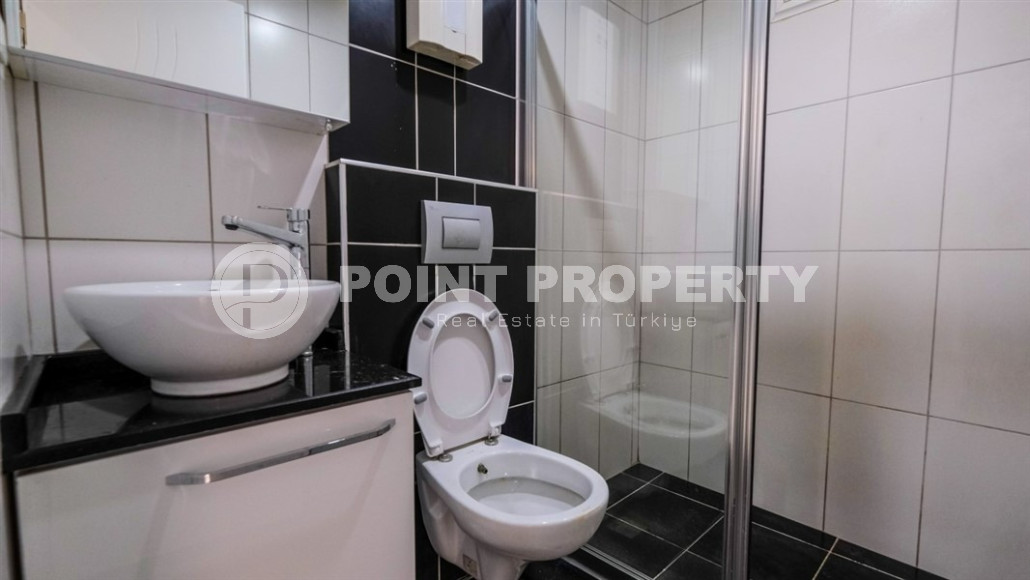 Уютные меблированные апартаменты планировкой 1+1, 55 м2, в самом центре Аланьи в районе самого известного пляжа Клеопатры.-id-1113-фото-4