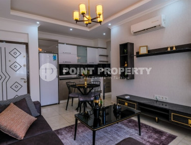 Уютные меблированные апартаменты планировкой 1+1, 55 м2, в самом центре Аланьи в районе самого известного пляжа Клеопатры.-id-1113-фото-5