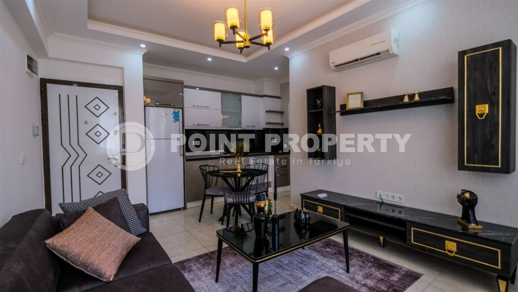 Уютные меблированные апартаменты планировкой 1+1, 55 м2, в самом центре Аланьи в районе самого известного пляжа Клеопатры.-id-1113-фото-5