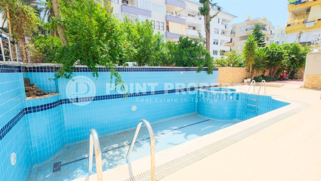 Уютные меблированные апартаменты планировкой 1+1, 55 м2, в самом центре Аланьи в районе самого известного пляжа Клеопатры.-id-1113-фото-6